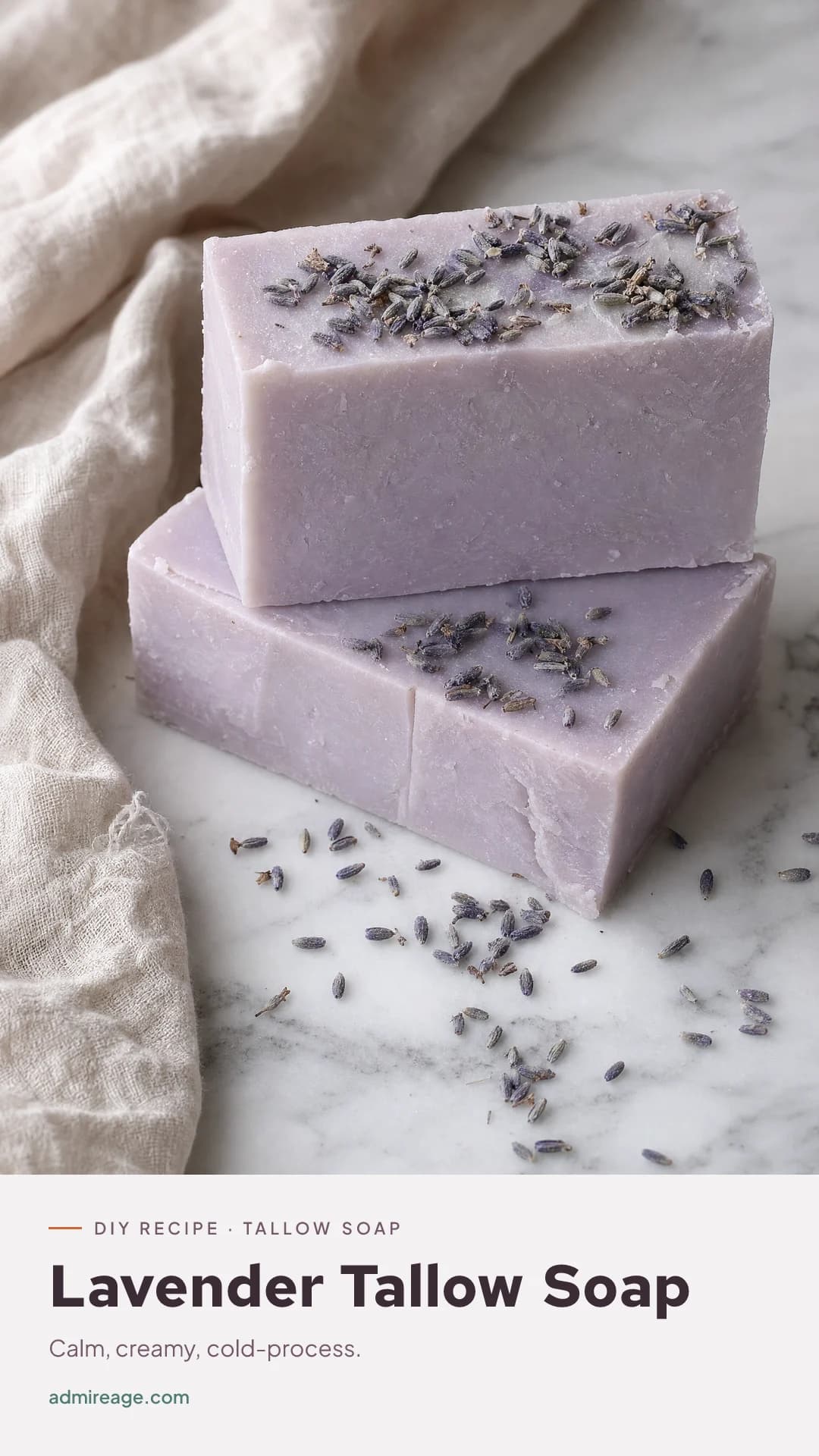 Pale lavender tallow soap bars topped with dried lavender buds.