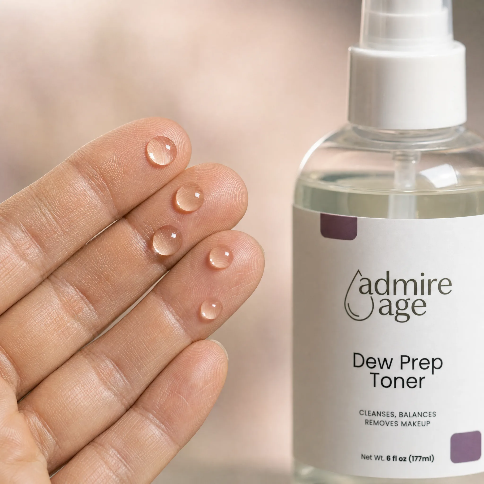 Clear Dew Prep Toner droplets on fingertips beside the bottle