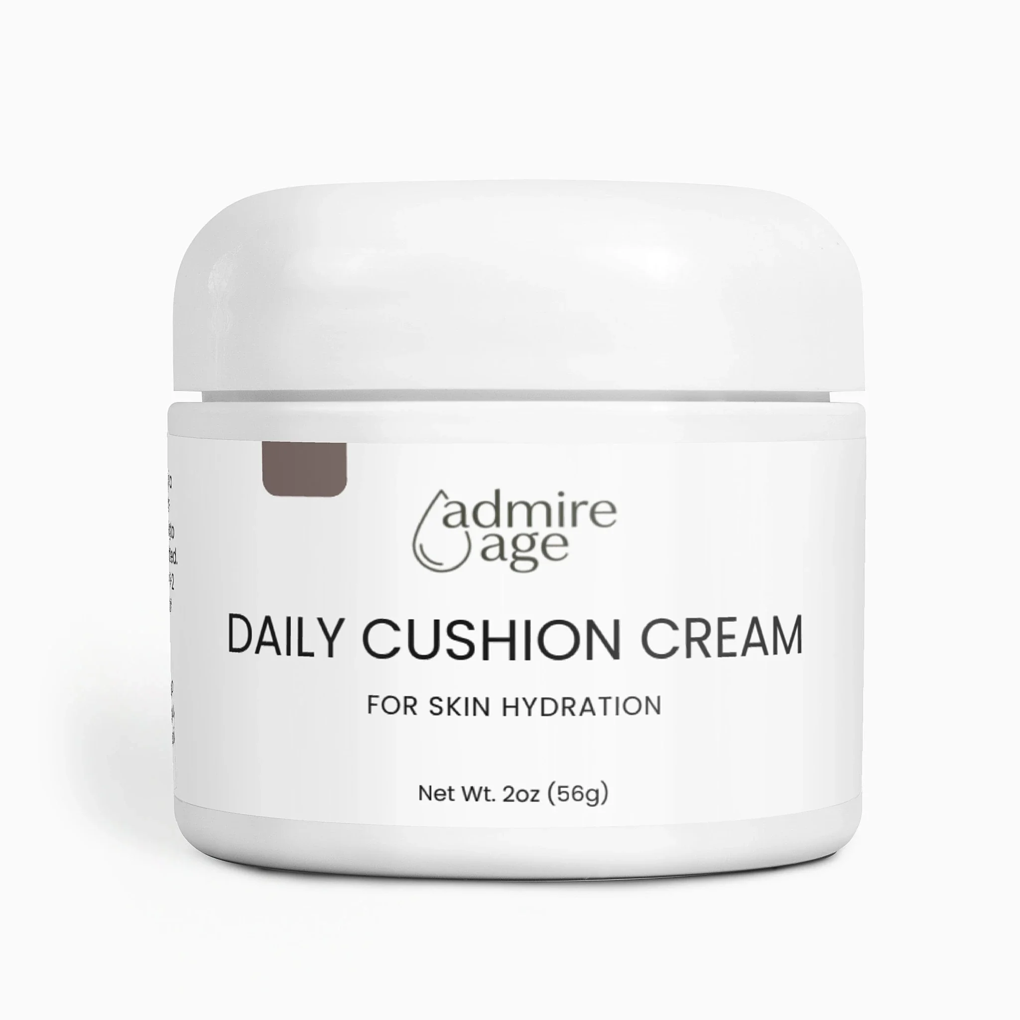 Front-on studio shot of the Admire Age cream jar with a soft white lid, brand logo, and label reading Daily Cushion Cream for Skin Hydration, Net Wt. 2 oz (56 g)