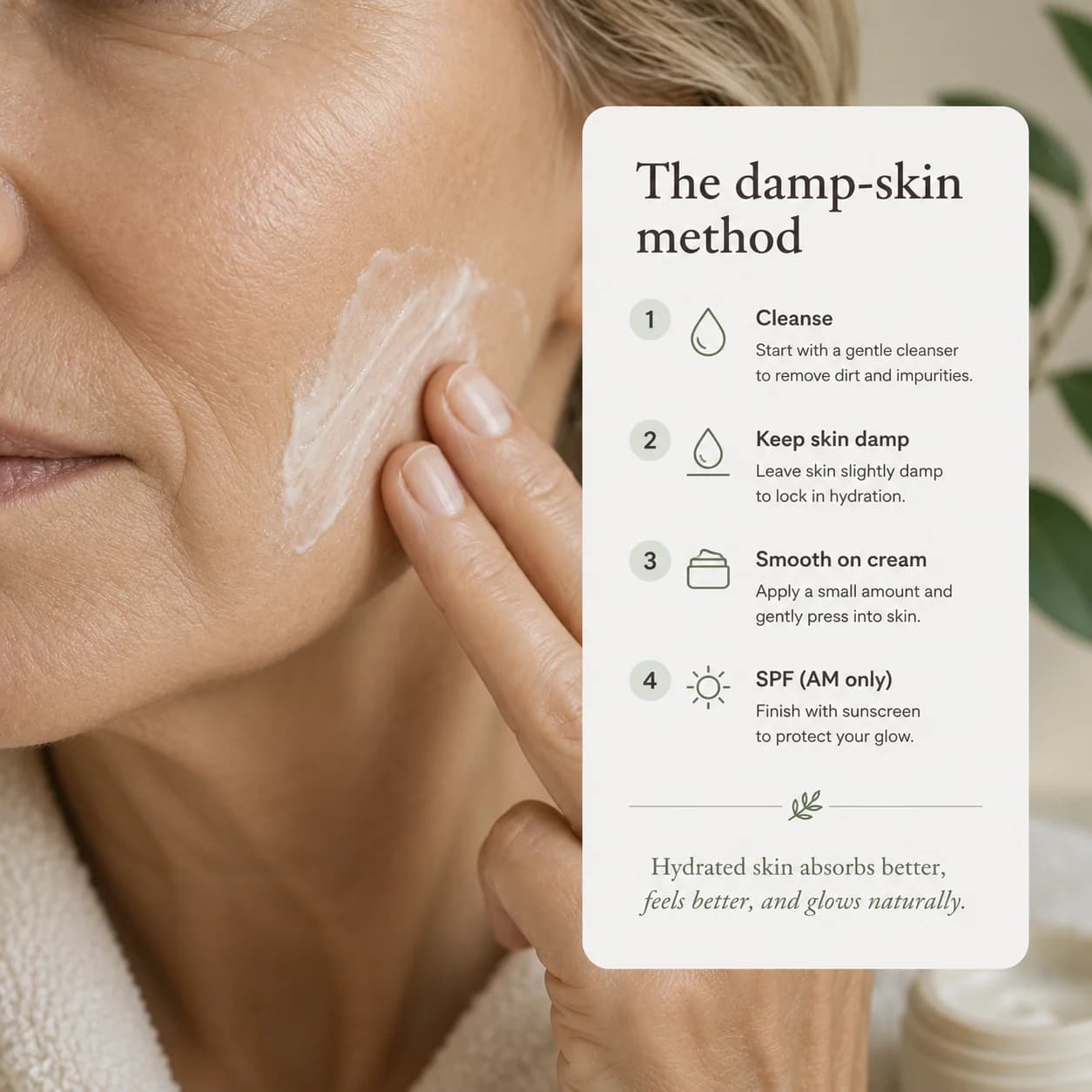 Close-up of a mature woman gently pressing a smear of cream into her cheek, with a card showing the four damp-skin method steps: cleanse, keep skin damp, smooth on cream, and SPF in the morning