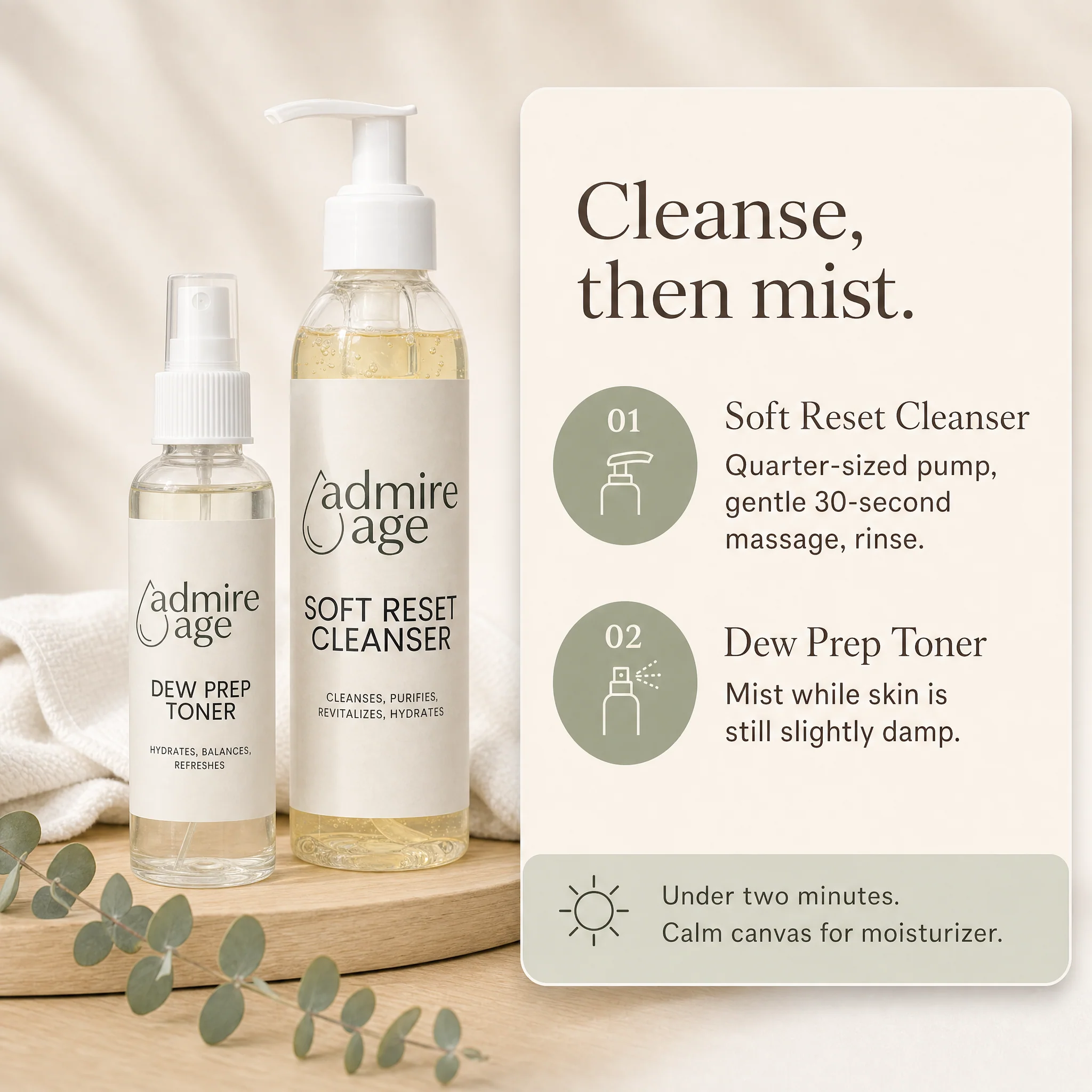 Admire Age Dew Prep Toner spray bottle in front of the Soft Reset Cleanser pump bottle on a light oak wooden tray with a folded white washcloth draped behind and a eucalyptus sprig in the foreground; a card to the right titled 'Cleanse, then mist.' lists Soft Reset Cleanser and Dew Prep Toner with a sage callout line 'Under two minutes. Calm canvas for moisturizer.'