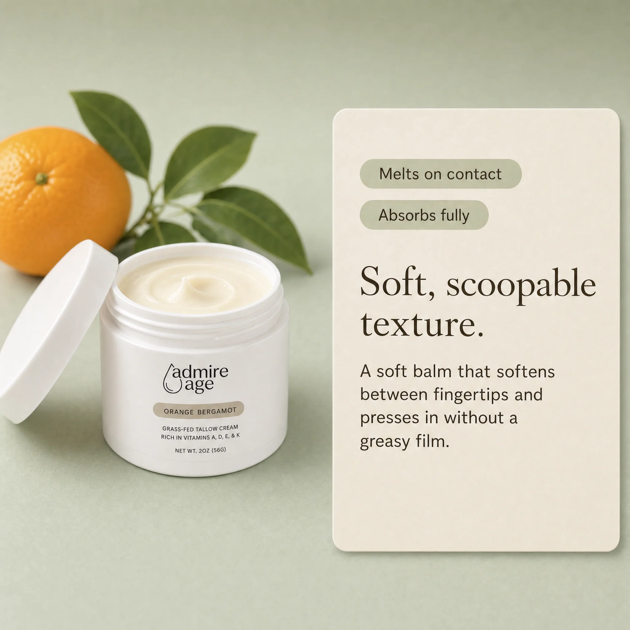 Close-up of the soft, scoopable Orange Bergamot tallow cream texture in the open jar